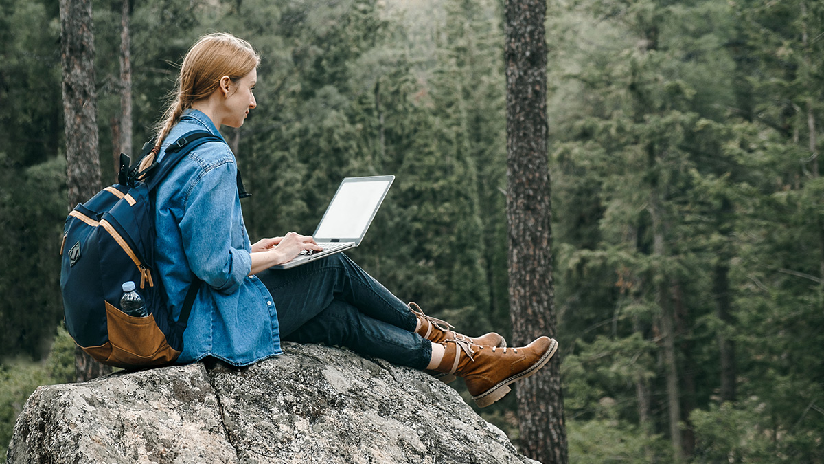 Creative professionals using their equipment to work outdoors.