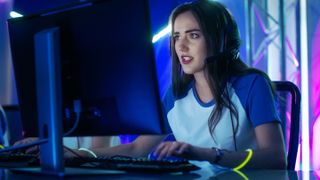 PC gamer playing on a desktop