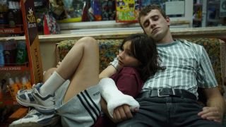 Sophie and Calum cuddle up on a bench in Aftersun, one of the best new Max movies