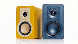Dali Kupid speakers in blue and yellow, showing the two-way driver design