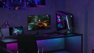Gigabyte Aorus FI32U gaming setup on desk