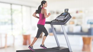 Woman running on ProForm Premier 900 treadmill