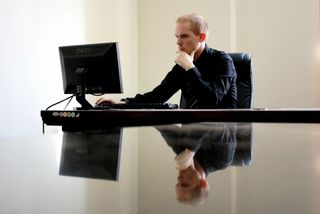 Person working at a computer in an office