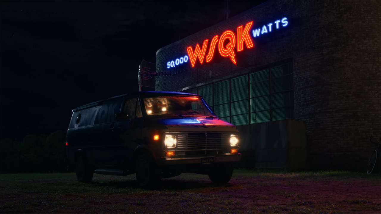 A screenshot of a van sitting outside a radio station at night in Stranger Things season 5