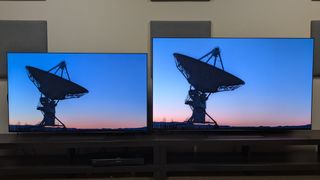 The LG G5 (left) and LG G6 (right) OLED TVs showing a picture of a satellite at sunset on screen. The G5 shows more signs of color banding compared to the G6, noticeable in the sunset itself 