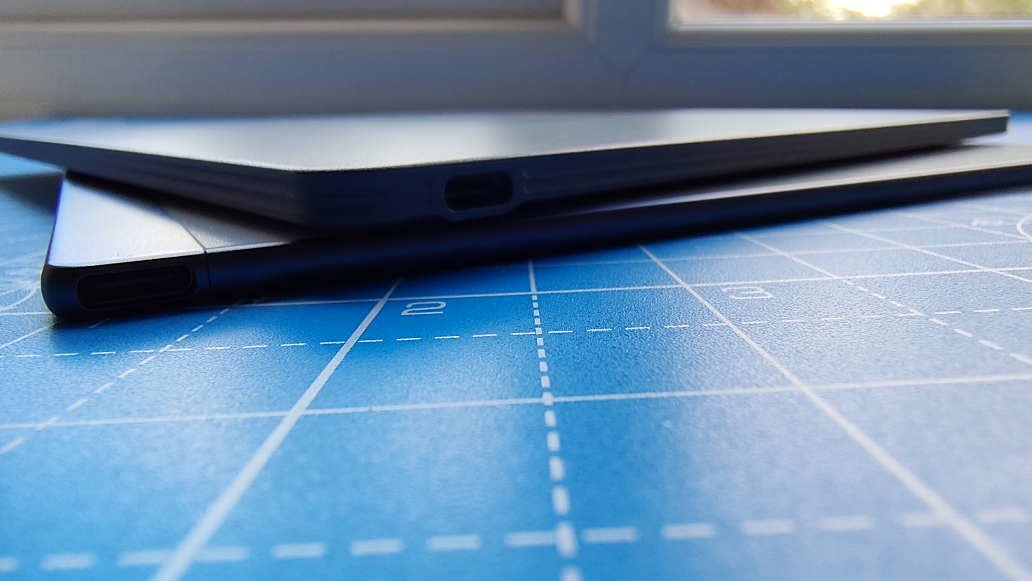 A reMarkable Paper Pure against a blue grid mat during our review process