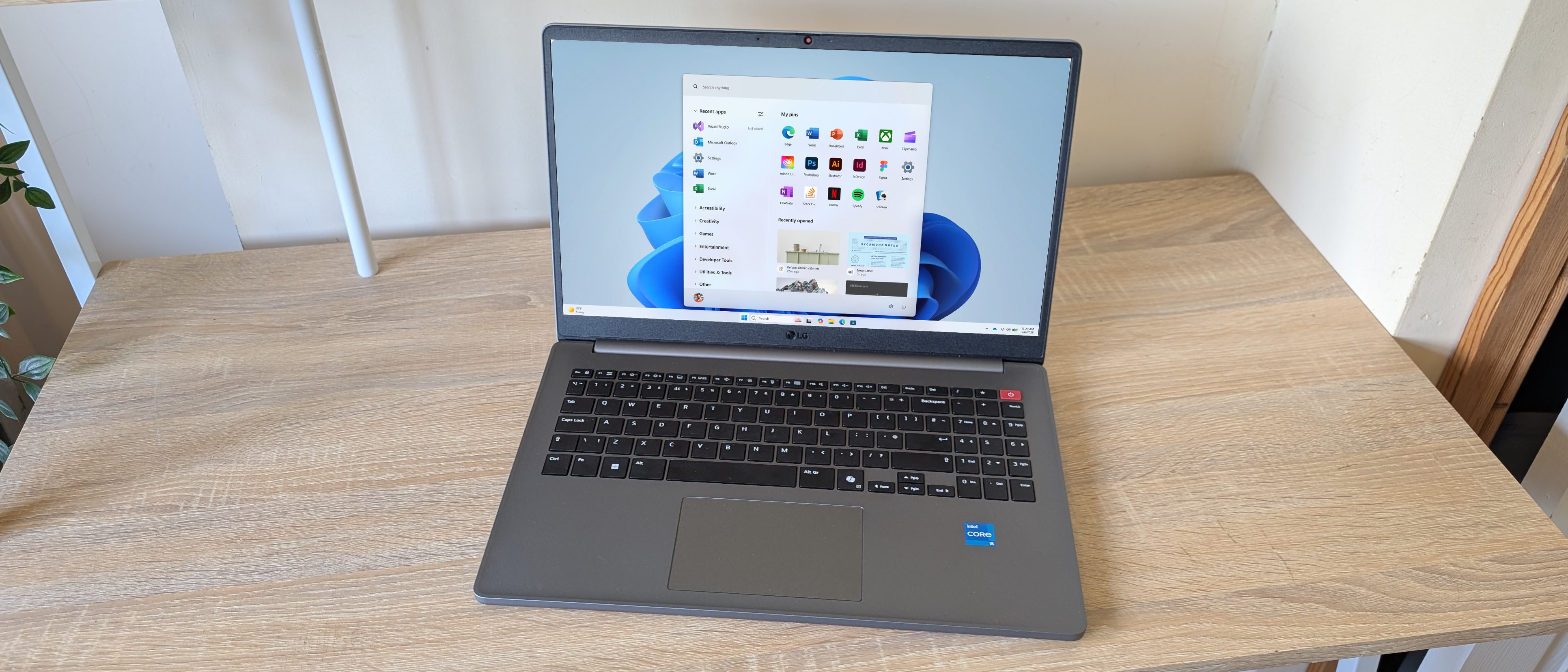 The LG Gram Book laptop pictured on a wooden desk.