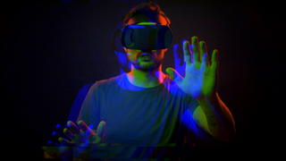 A person in a VR headset experiencing a terrifying game
