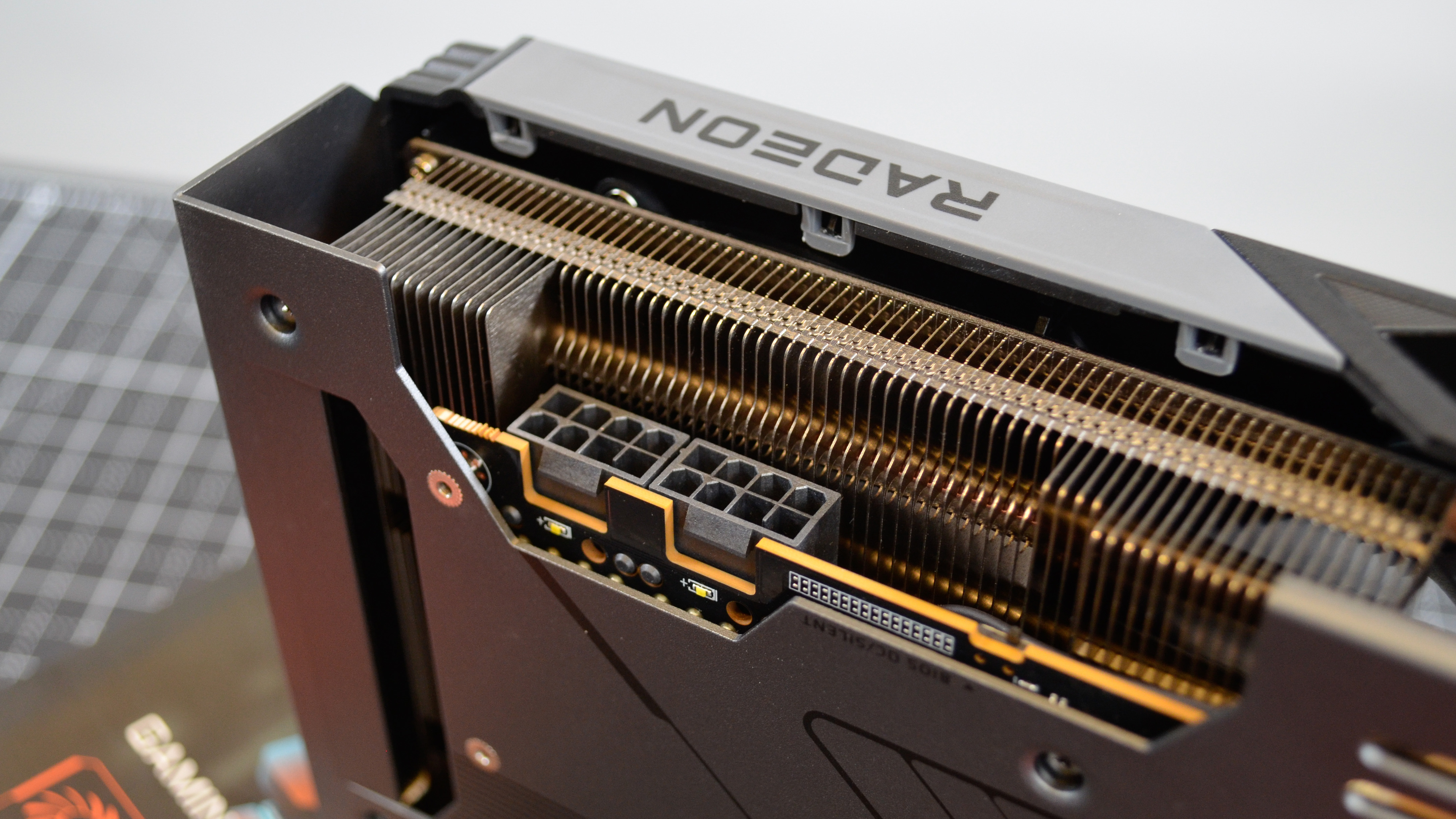 A Gigabyte Radeon RX 7700 XT Gaming OC on a desk