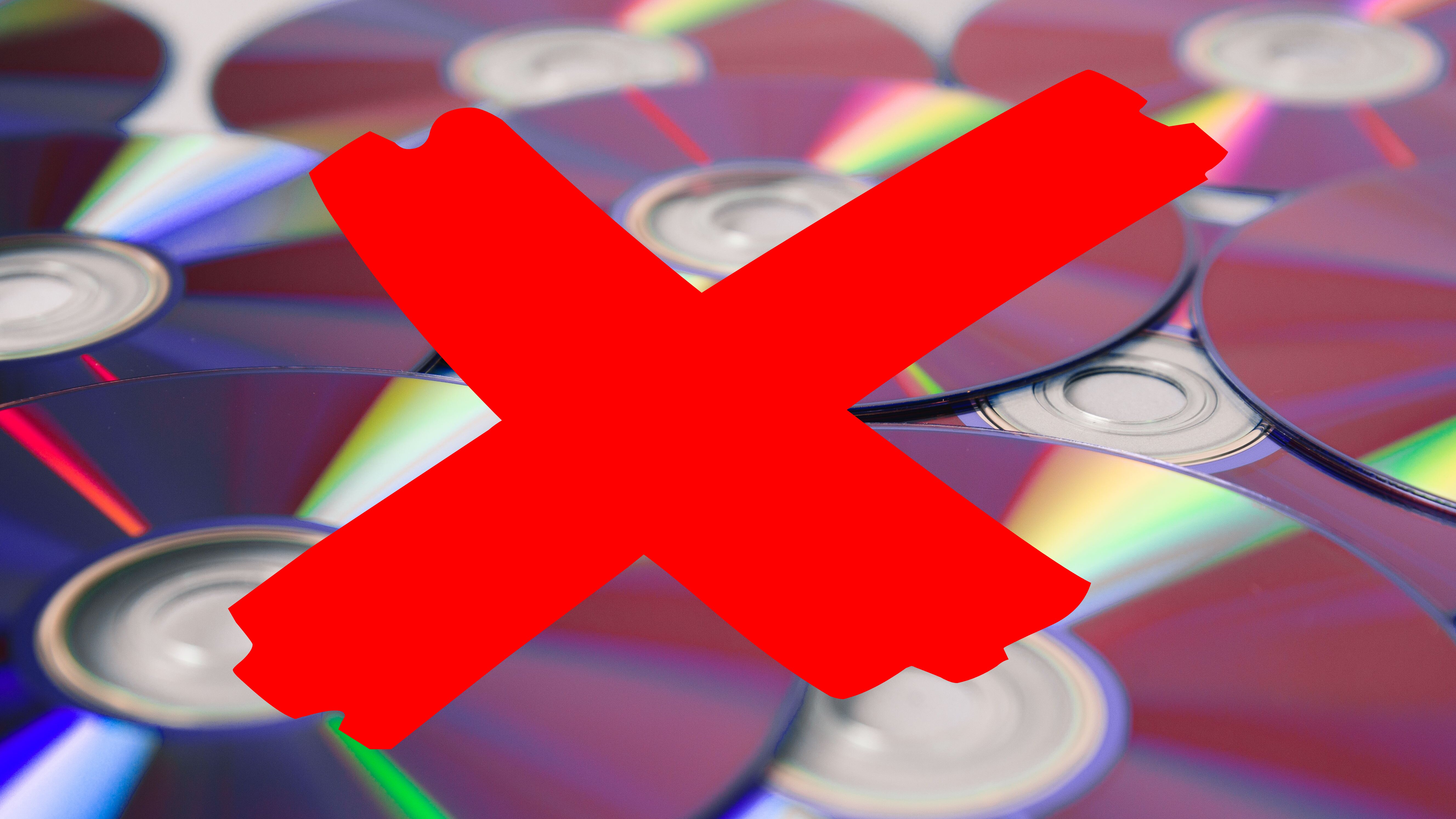 A selection of shiny discs with a red cross graphic over the top of them.