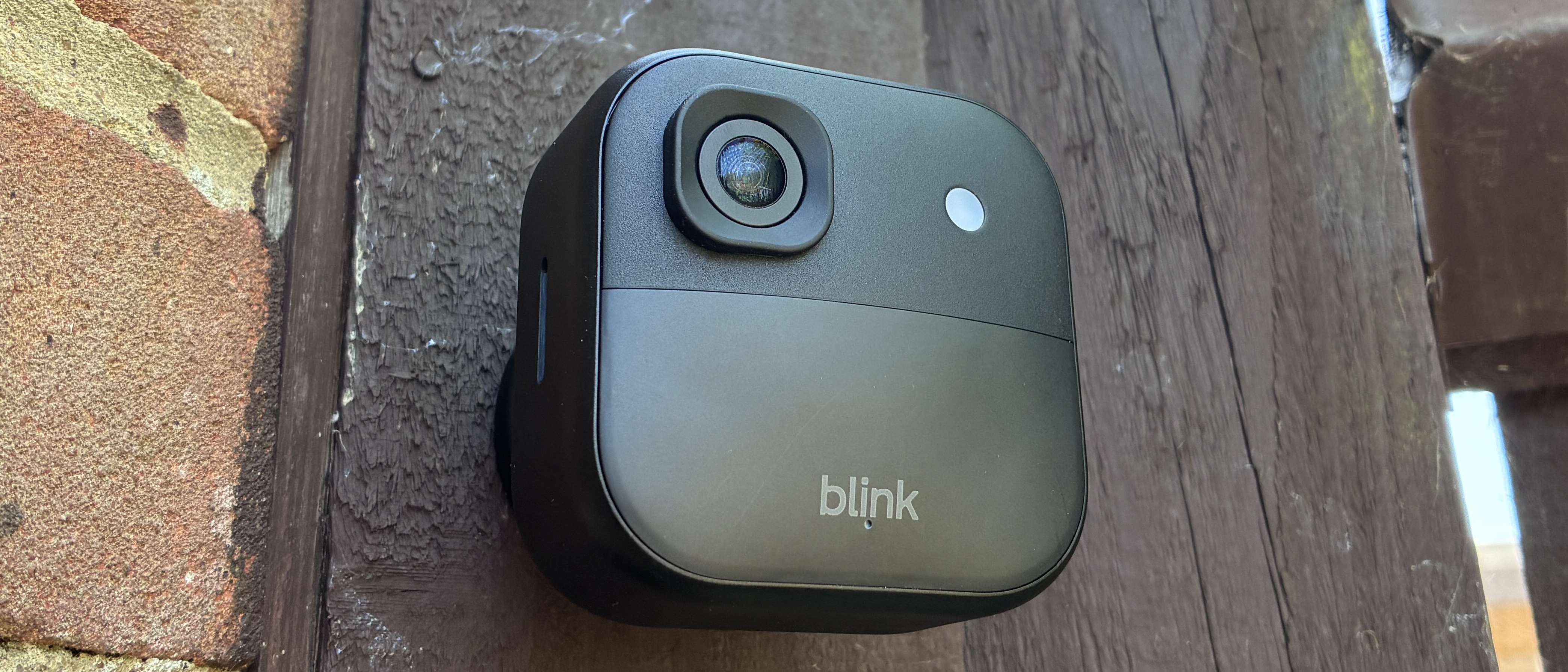 Blink Outdoor 2K+ security camera mounted on wall