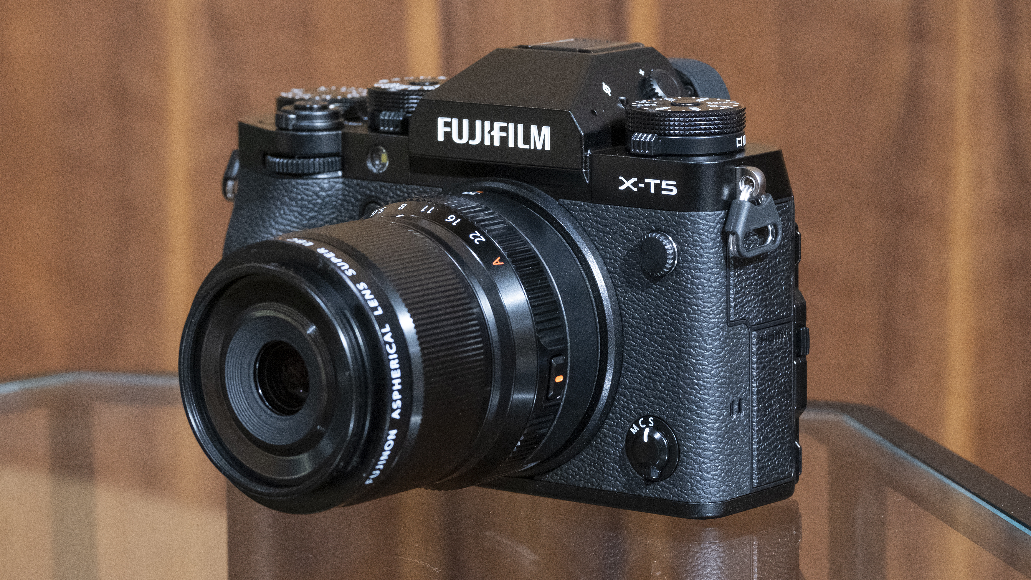The Fujifilm X-T5 camera sitting on a table