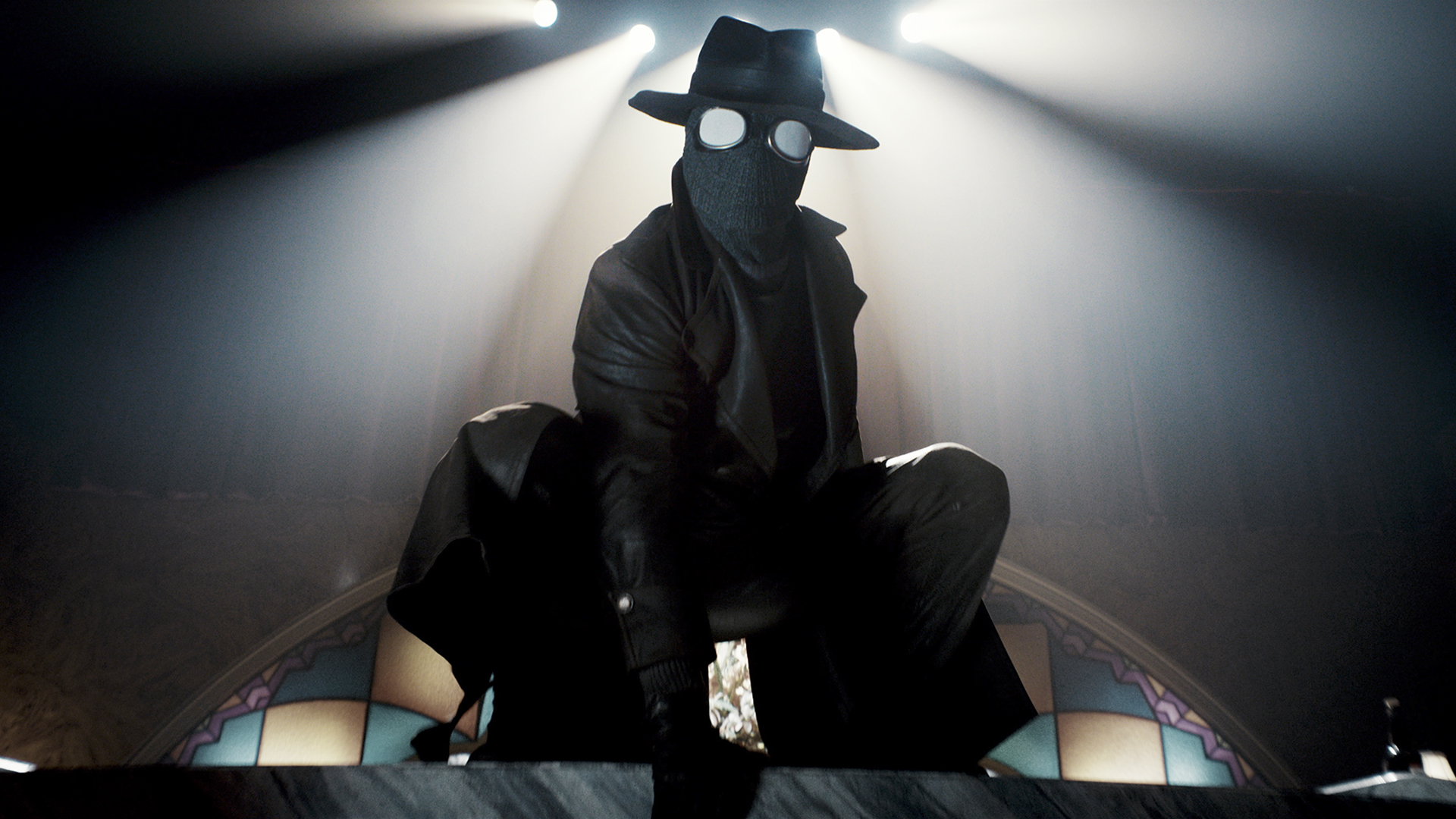 Nic Cage's Ben Reilly/The Spider squatting on a beam at night in Spider-Noir