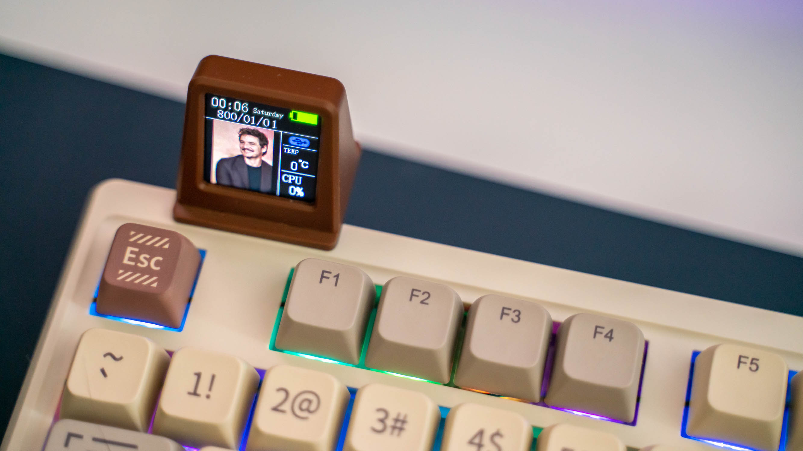 Epomaker RT100 on a blue desk pad