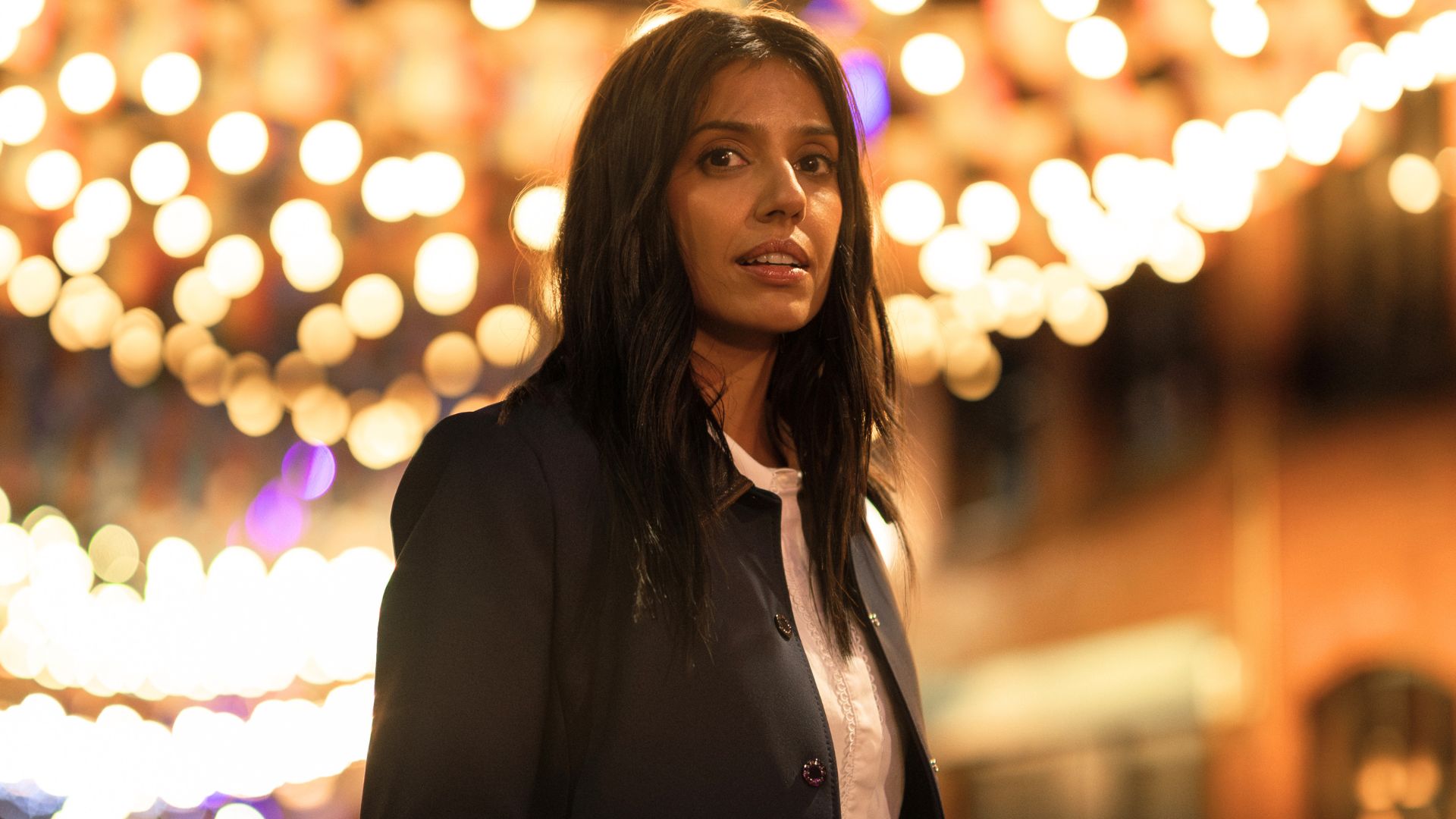 Ritu Arya looks at something in the distance