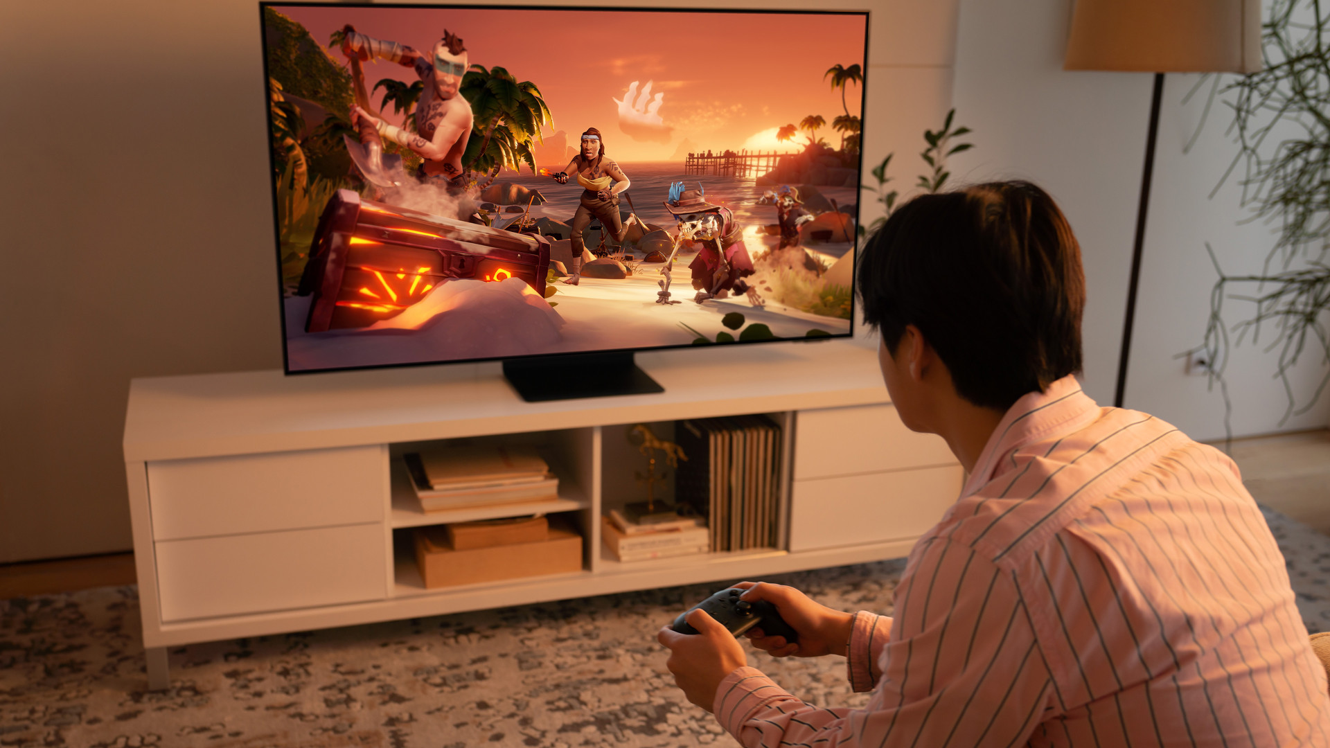 Someone playing Sea of Thieves via Xbox Cloud Gaming (Game Pass) on a Samsung Smart TV