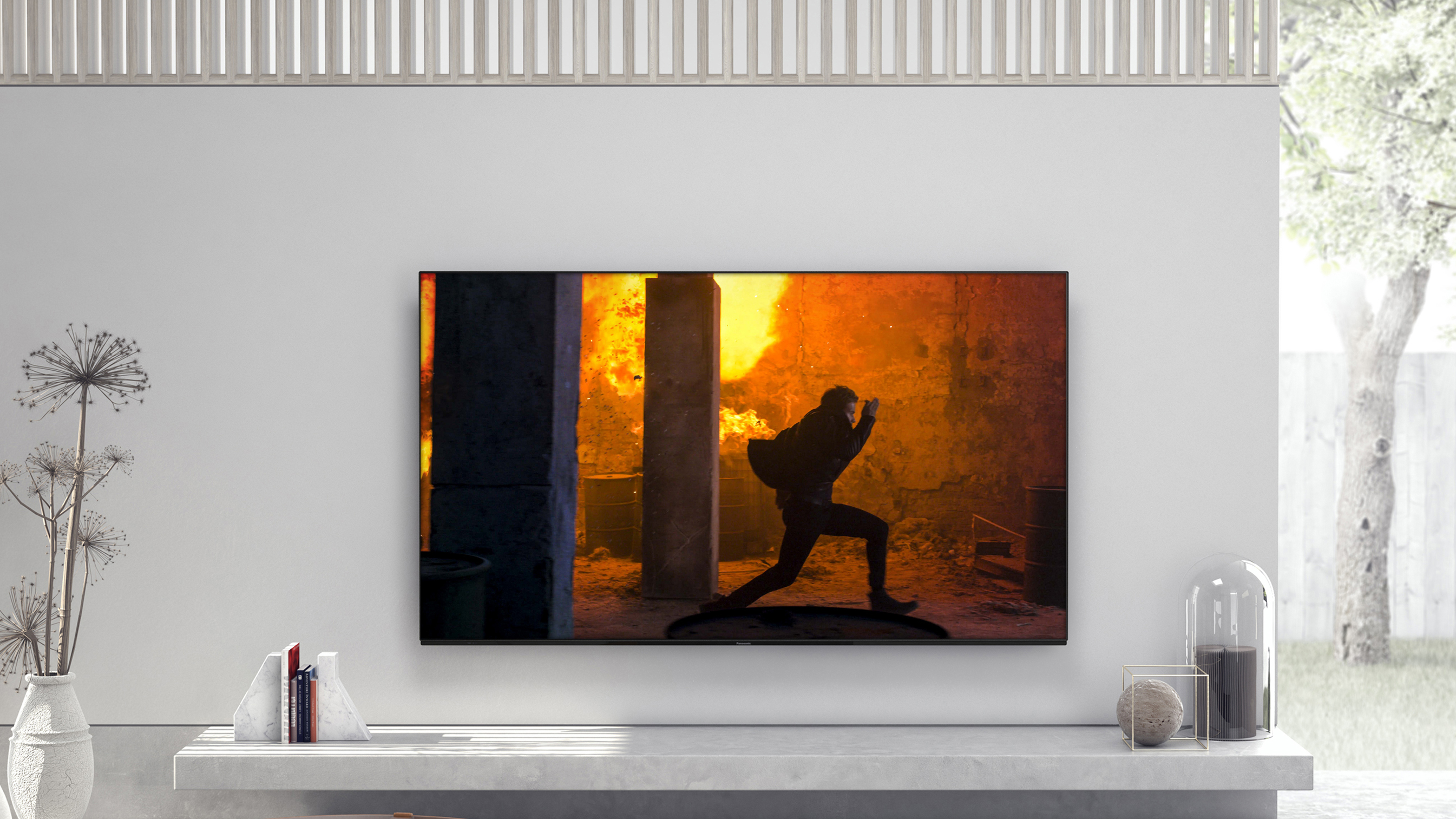 The Panasonic HZ980 4K OLED in a white living room