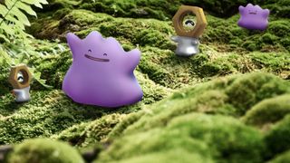 Ditto and Meltan play together in a forest environment. There are two of each Pok&eacute;mon.