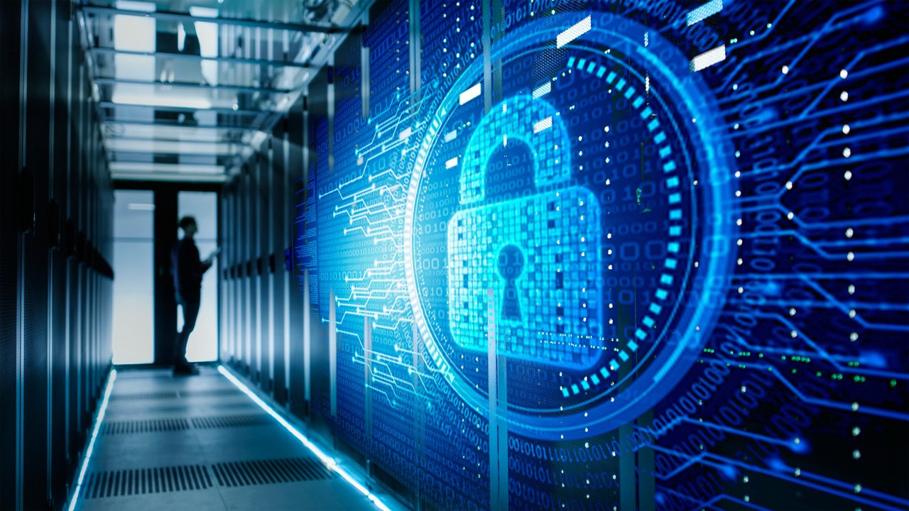Data center with a security logo on top of servers