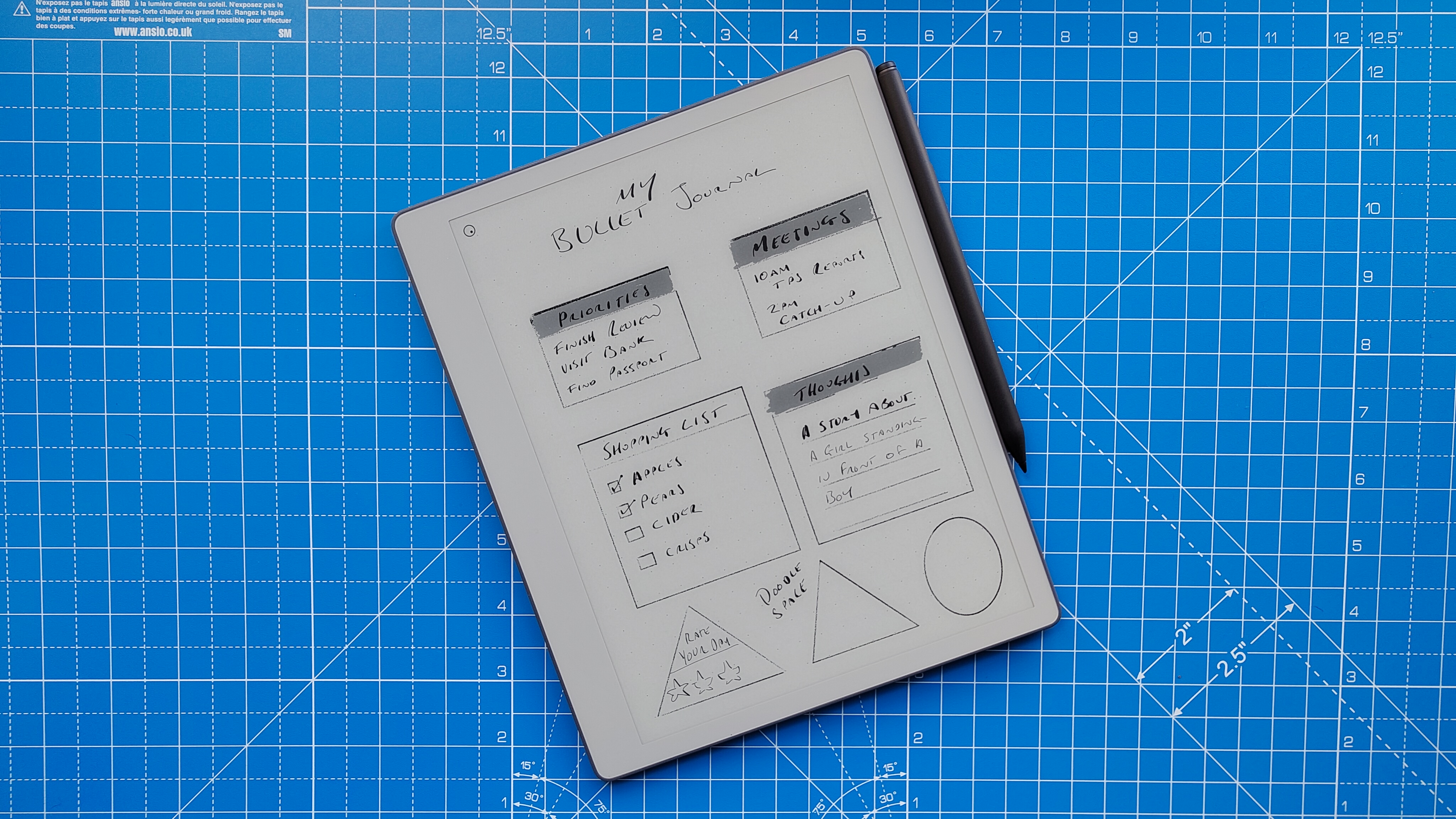 A reMarkable Paper Pure against a blue grid mat during our review process