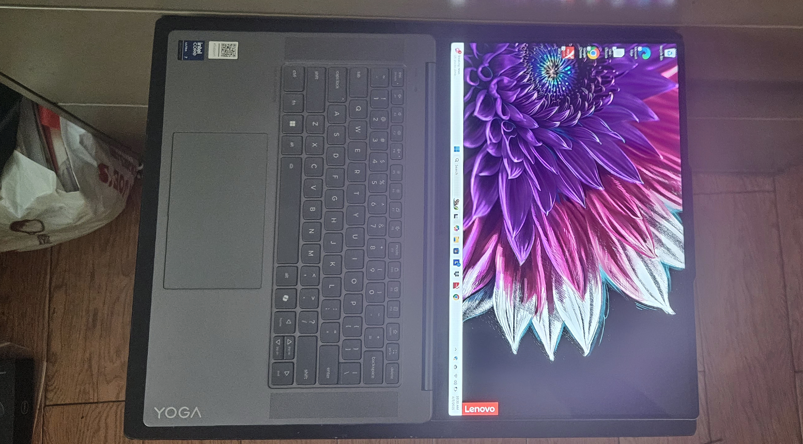Lenovo Yoga Slim 7i Aura Edition laptop open to show 180 degree hinge
