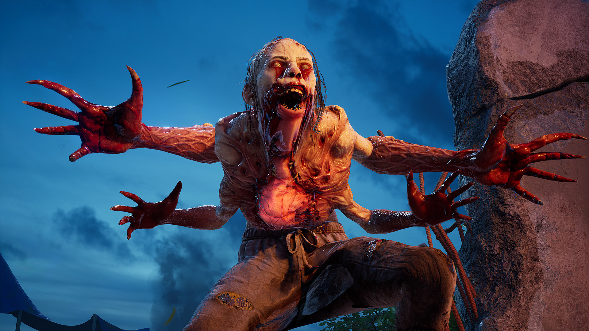 A monster stands with its four arms outstretched. The weak point in its stomach glows orange