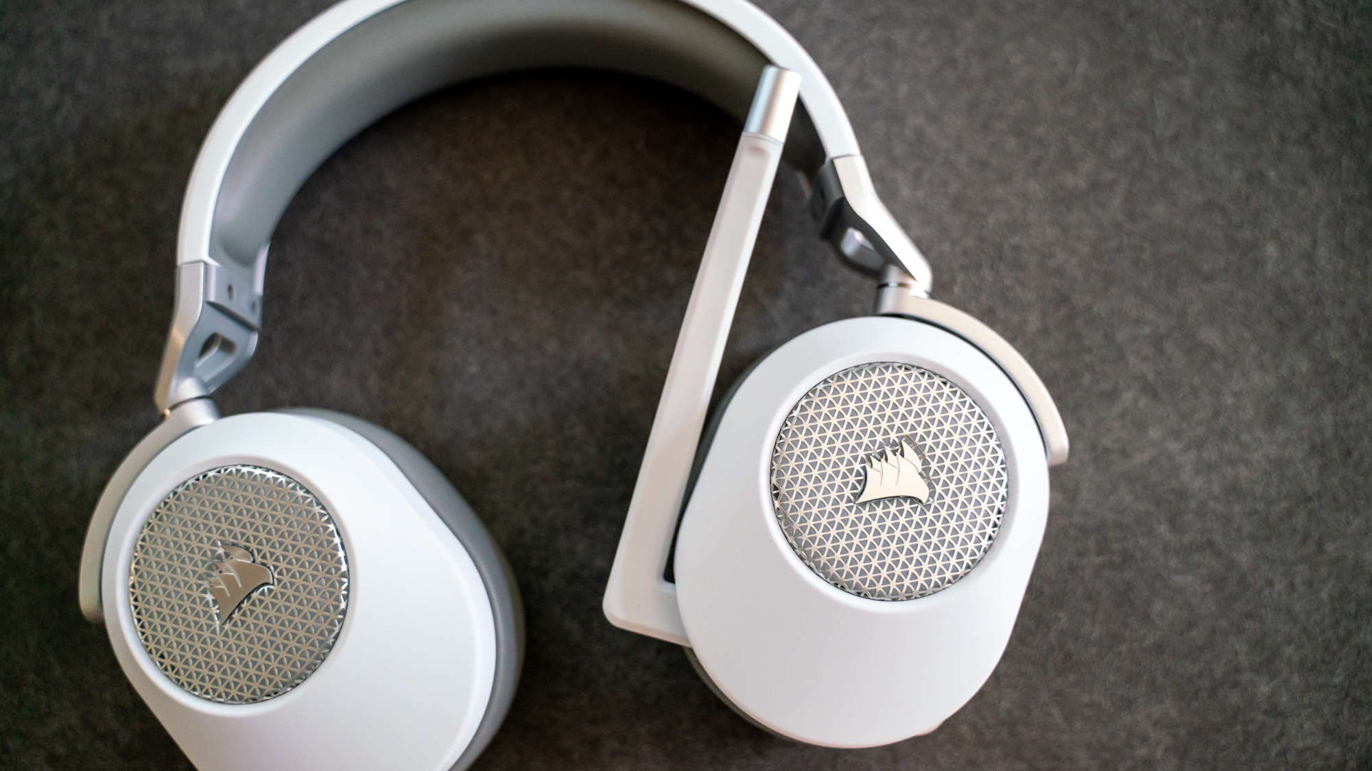Corsair HS65 Wireless on a gray desk mat