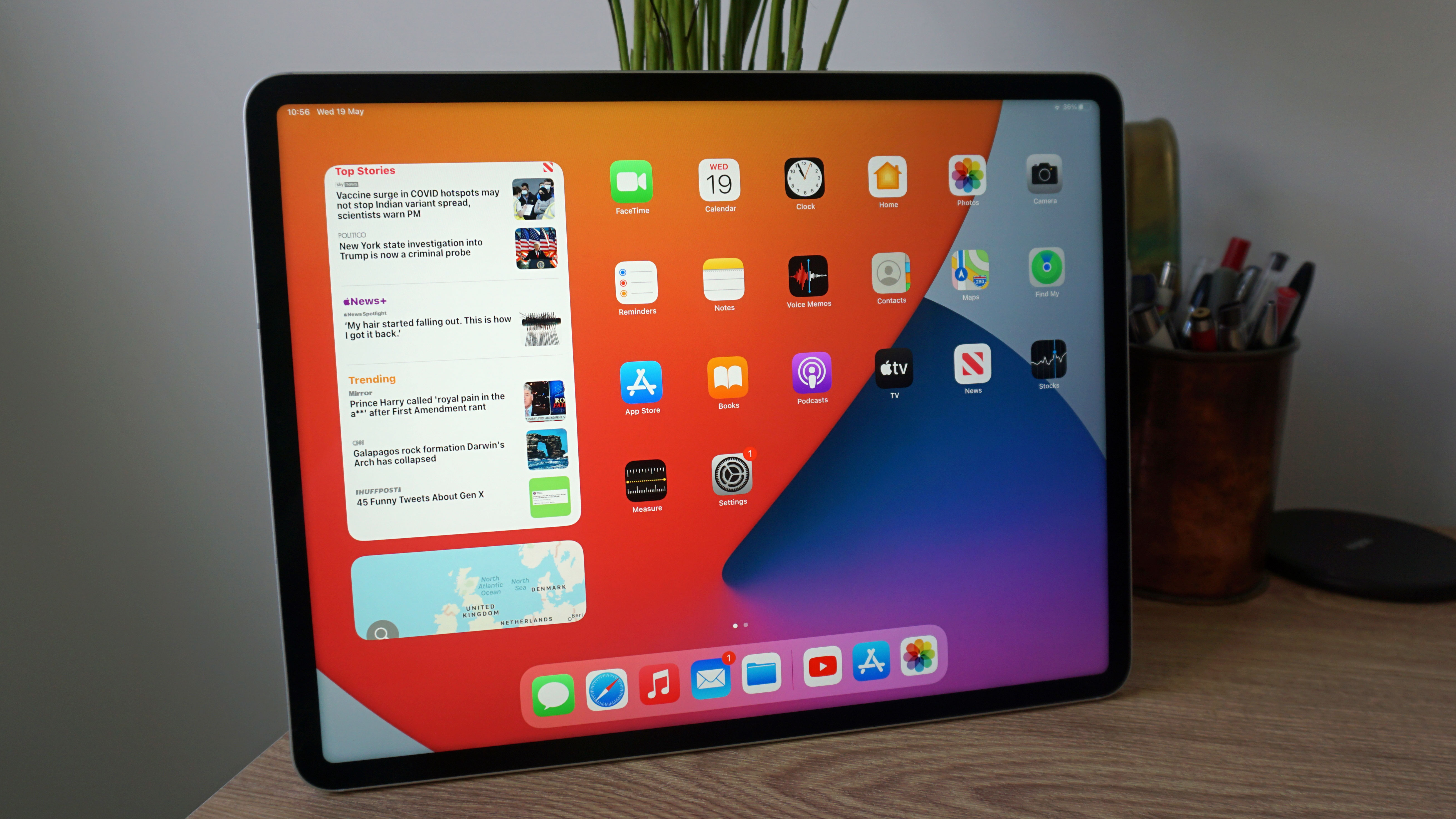 iPad Pro 12.9 (2021) resting on a table, with the screen on