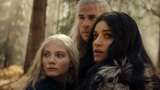 Geralt, Yennefer and Ciri huddle close
