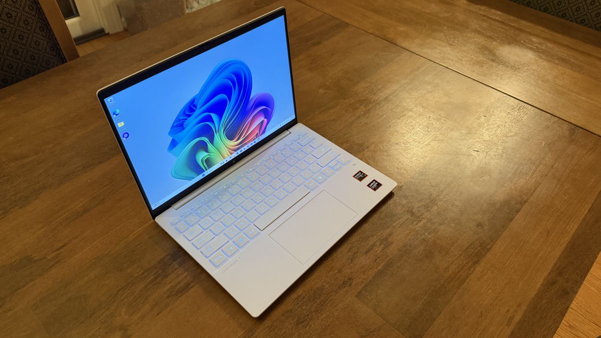 HP OmniBook 7 Aero laptop on a wooden desk