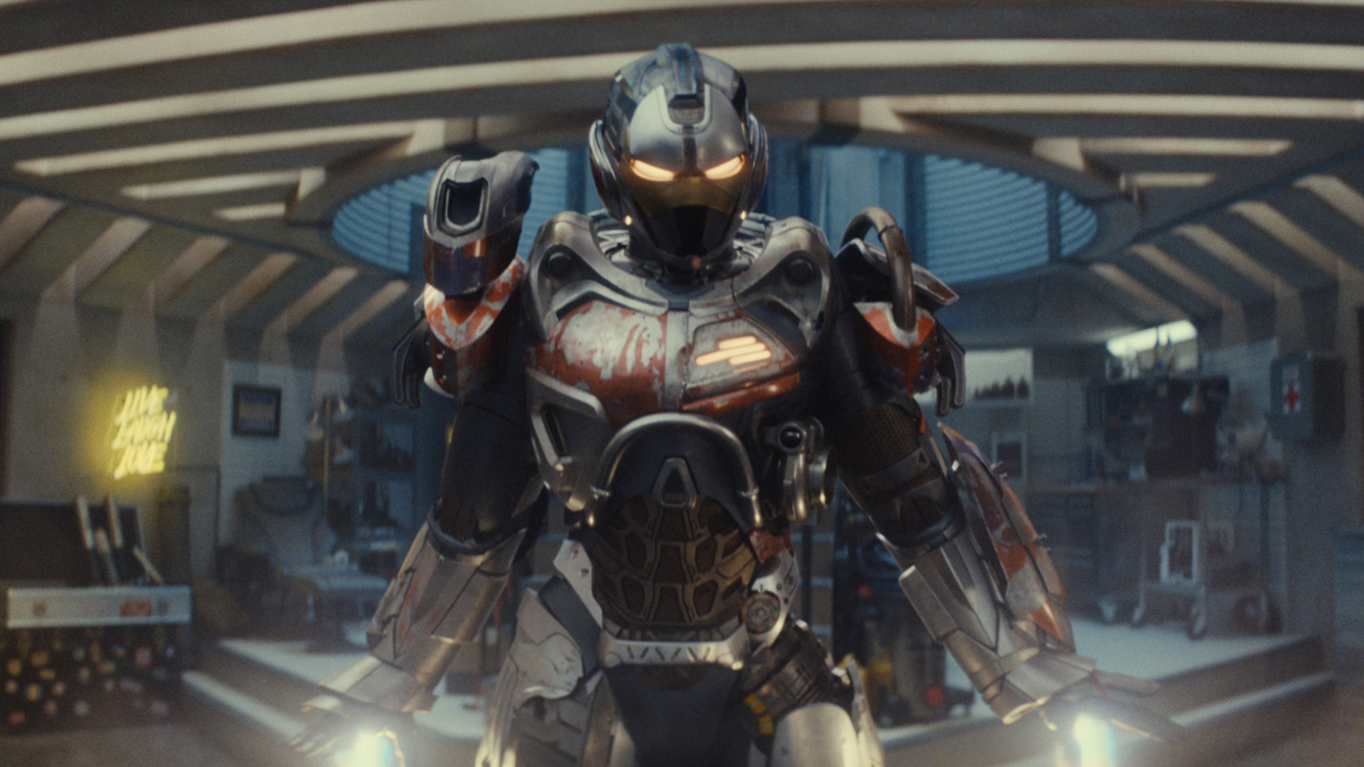Riri Williams levitating in her armored suit in Joe's underground bunker in Ironheart