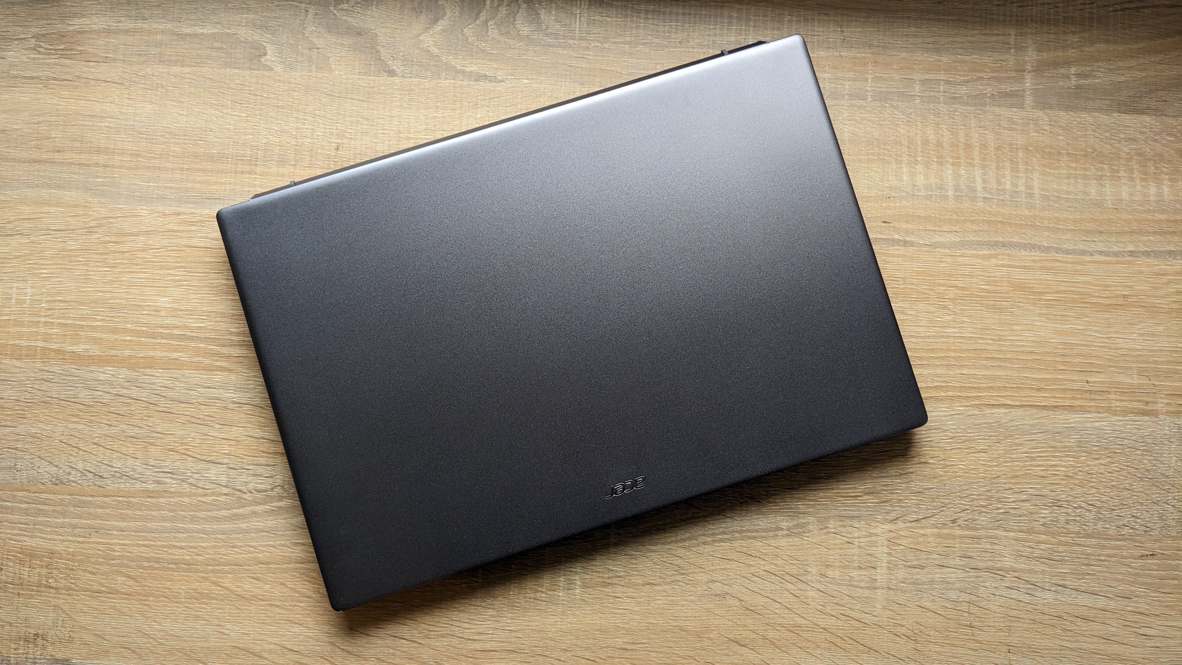 Acer Swift X 16 on wooden table