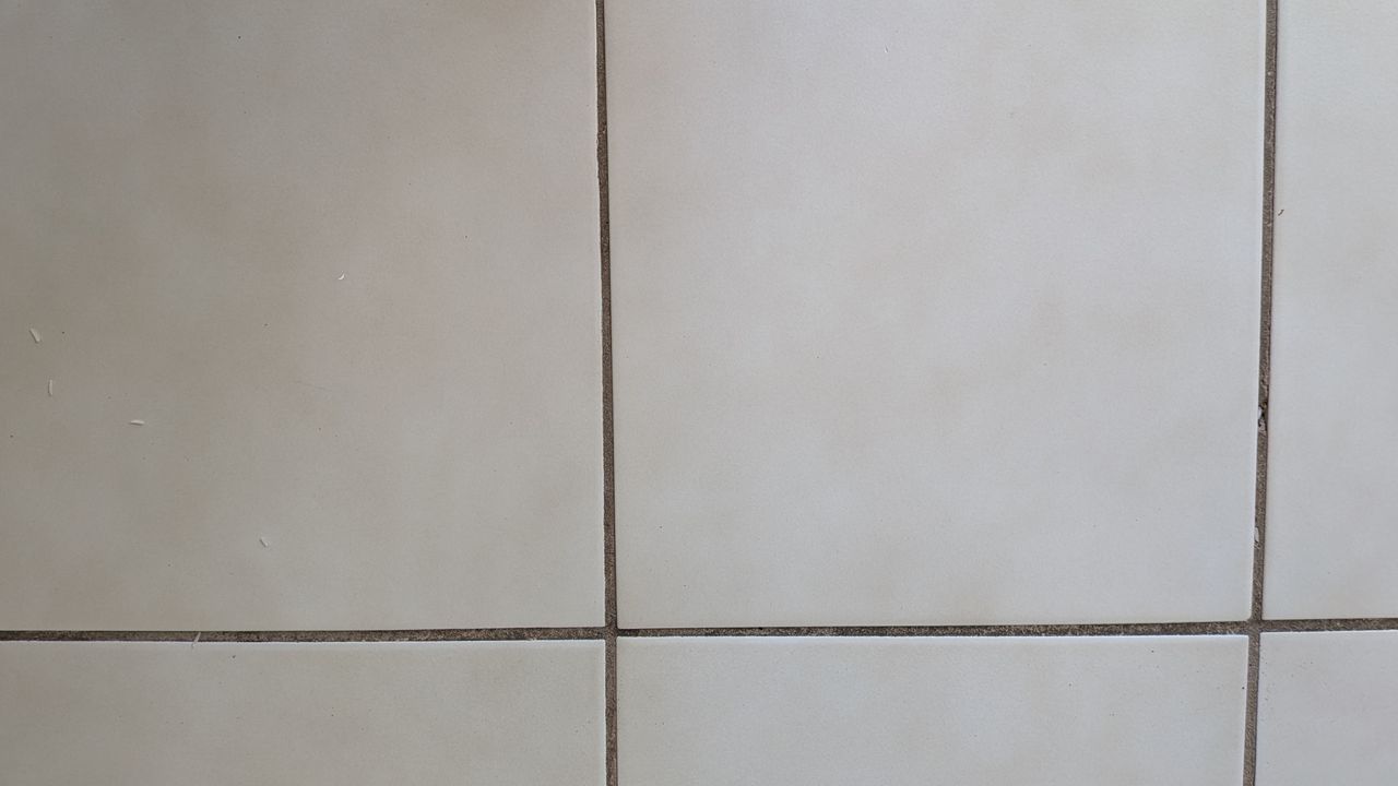 No ketchup remaining on tiled floor after the mopping test