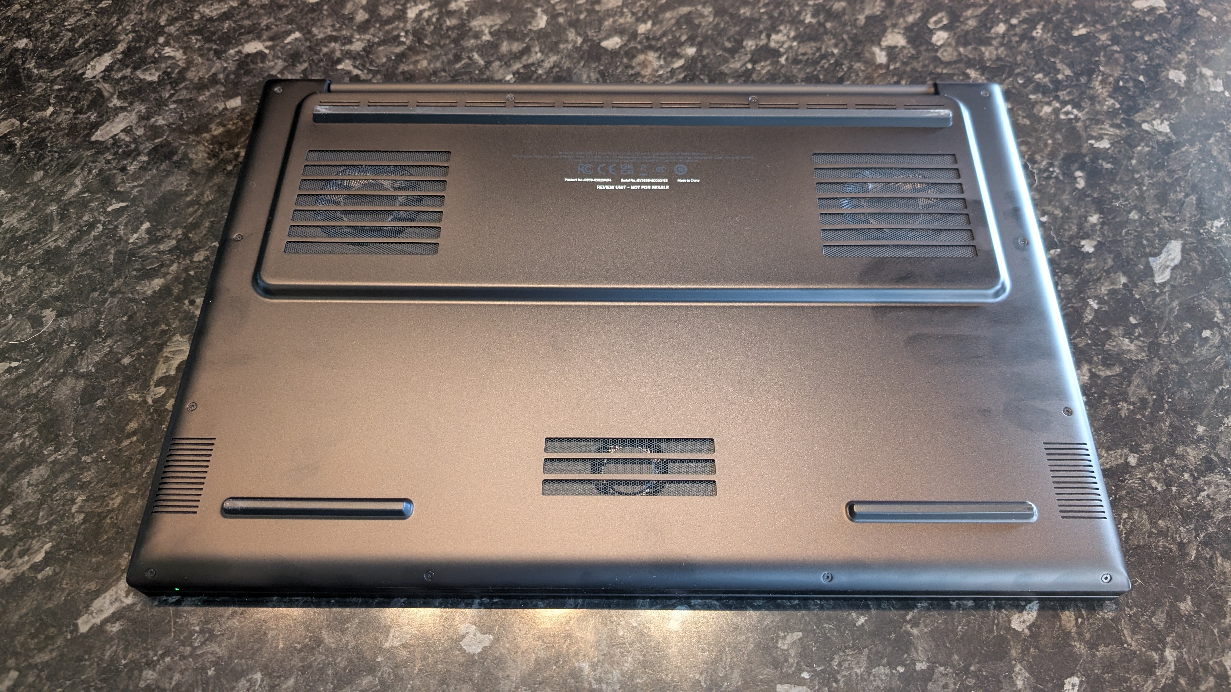 The Razer Blade 18 (2026) pictured on a black marble worktop.