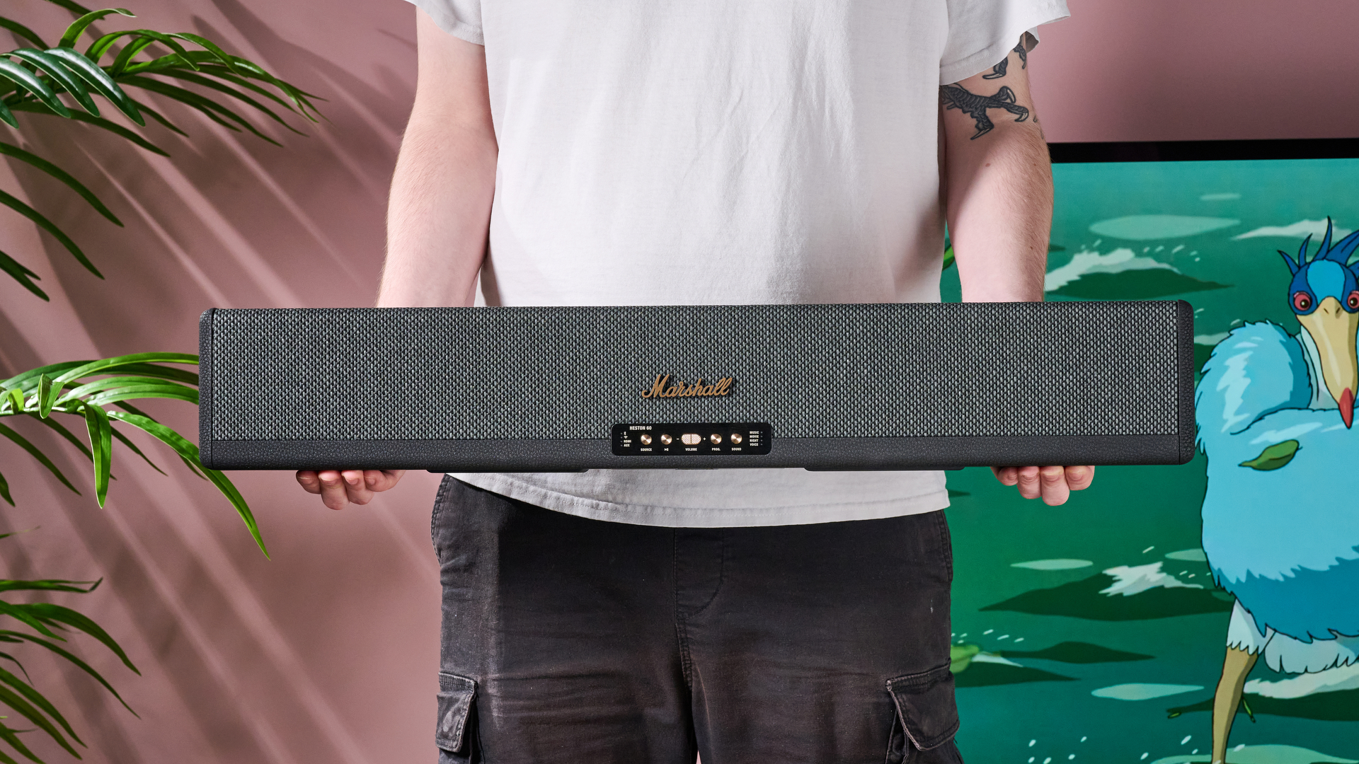 Person holding the Marshall Heston 60