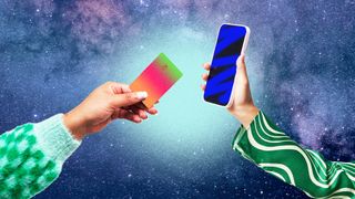 Hands holding a credit card and mobile phone