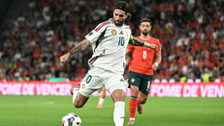 Dominik Szoboszlai of Hungary runs with the ball during the FIFA World Cup 2026 qualifier match between Portugal and Hungary at Estadio Jose Alvalade on October 14, 2025 in Lisbon, Portugal. 