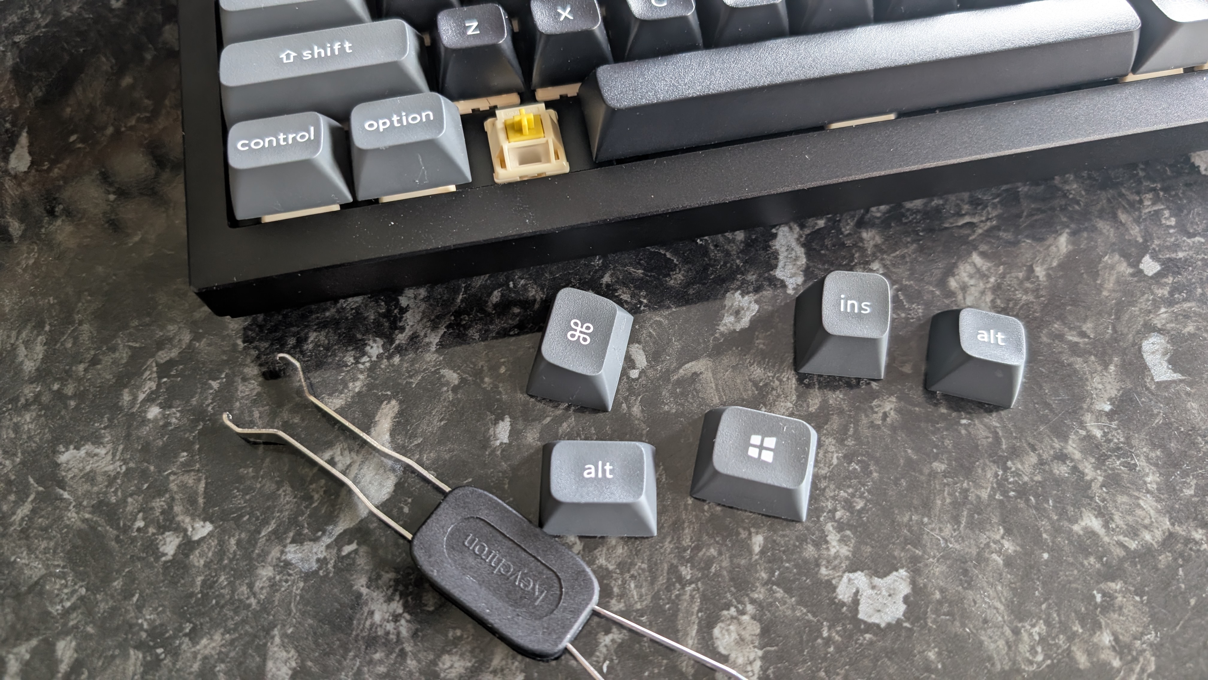 The Keychron Q1 Ultra 8K, photographed on a dark marble worktop.
