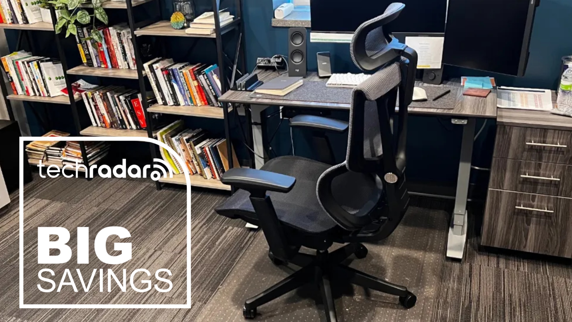 The FlexiSpot C7 in a home office during our tests next to a TechRadar badge that reads 'Big Savings'