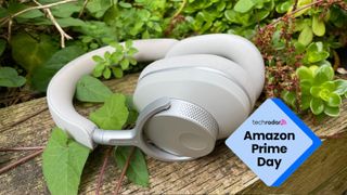 Cambridge Audio headphones with shrubbery in the background and TR's Prime Day badge