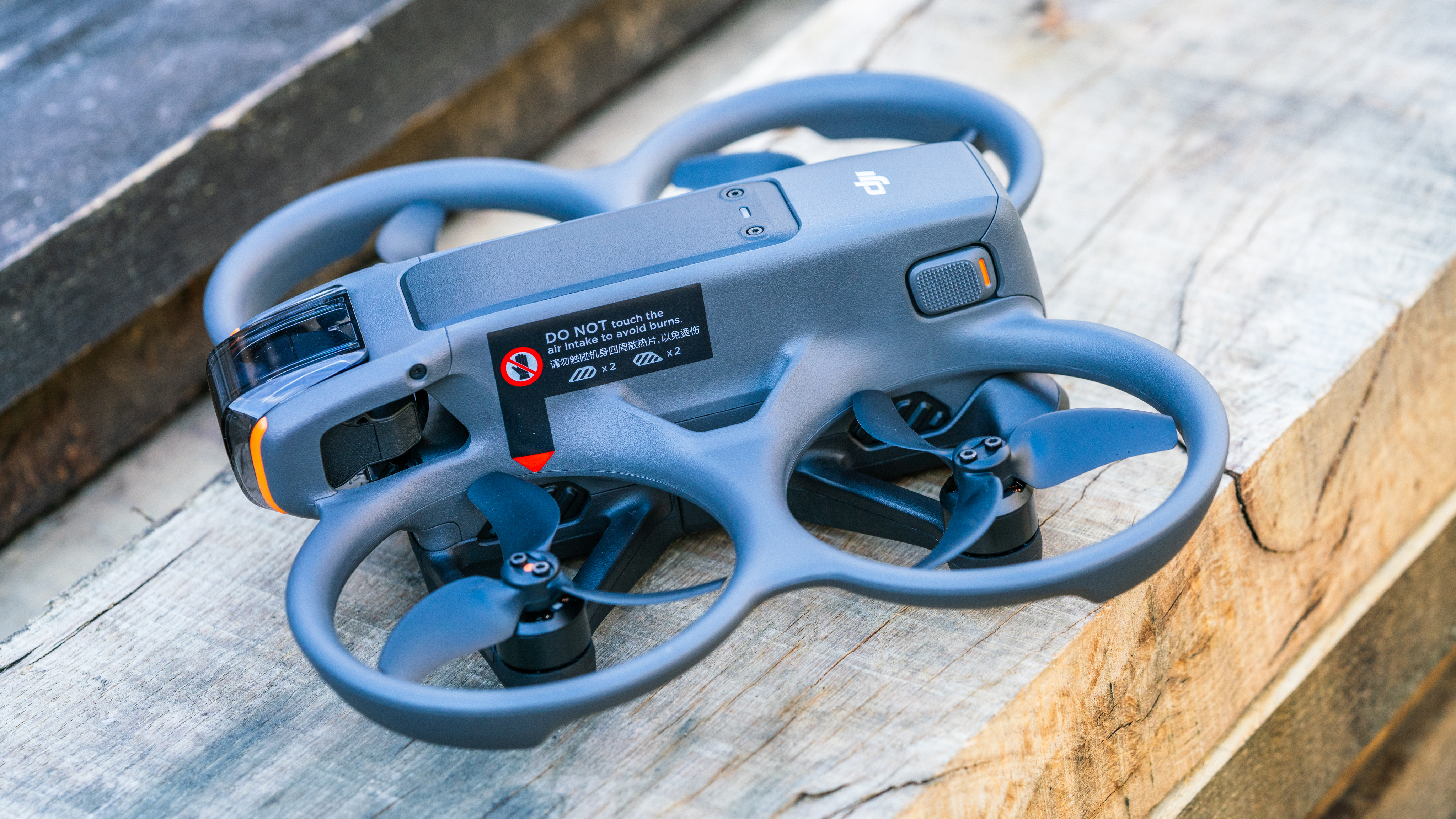 DJI Avata 2 FPV drone on a wooden bench