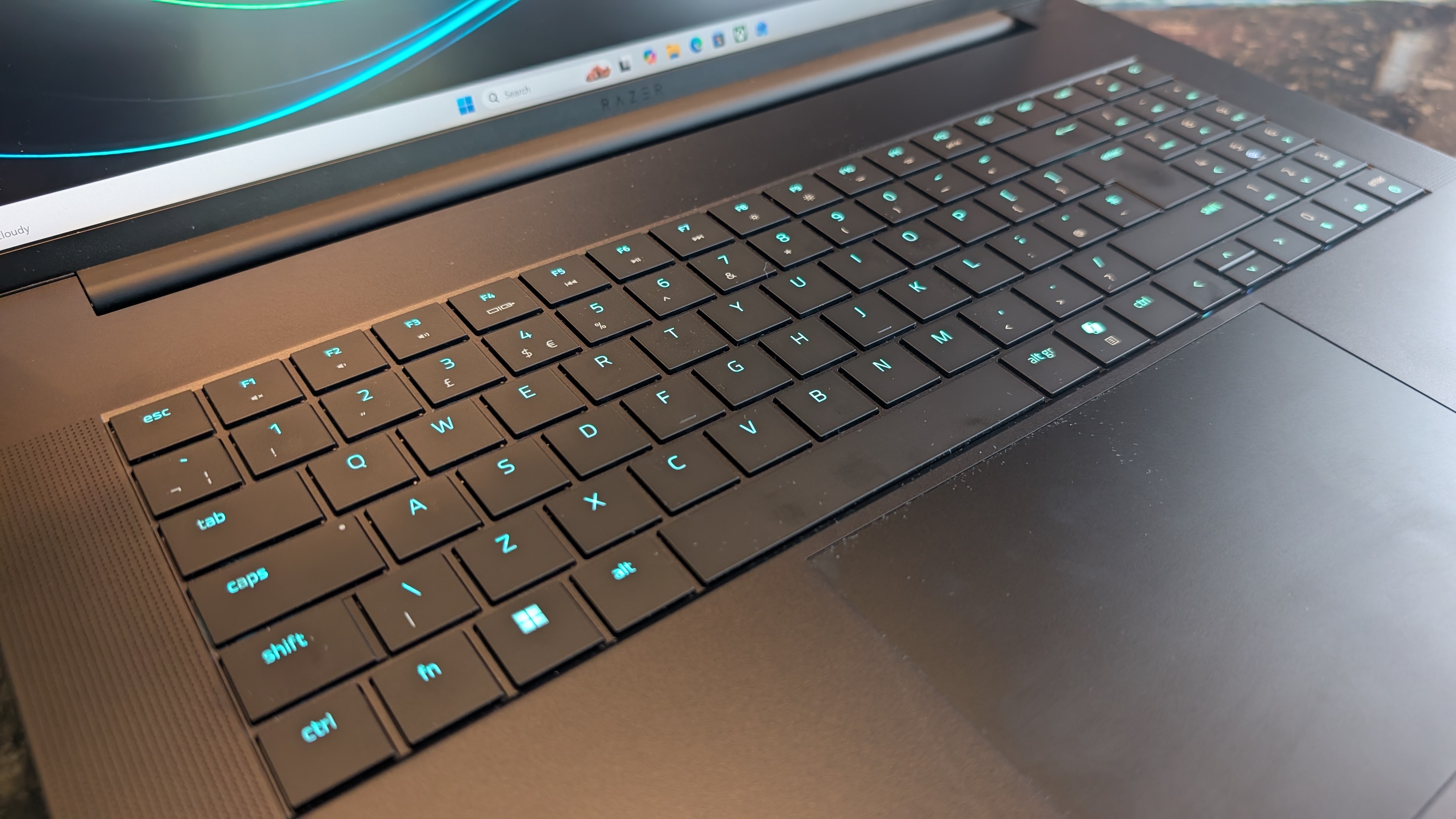 The Razer Blade 18 (2026) pictured on a black marble worktop.