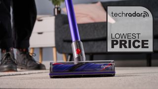 Close up of the floorhead on the Dyson V11 vacuum, with Lowest Price graphic overlaid