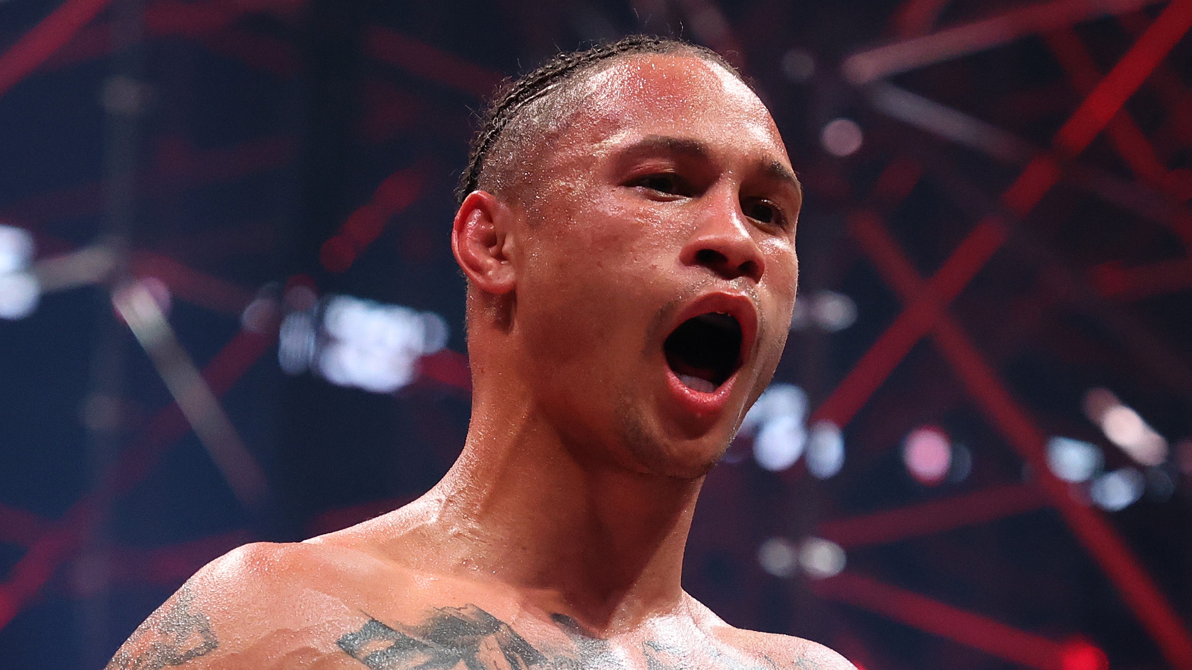 Boxer Regis Prograis, beaded with sweat, reacts by roaring in the ring, advance of November's Regis Prograis vs Devin Haney live stream.