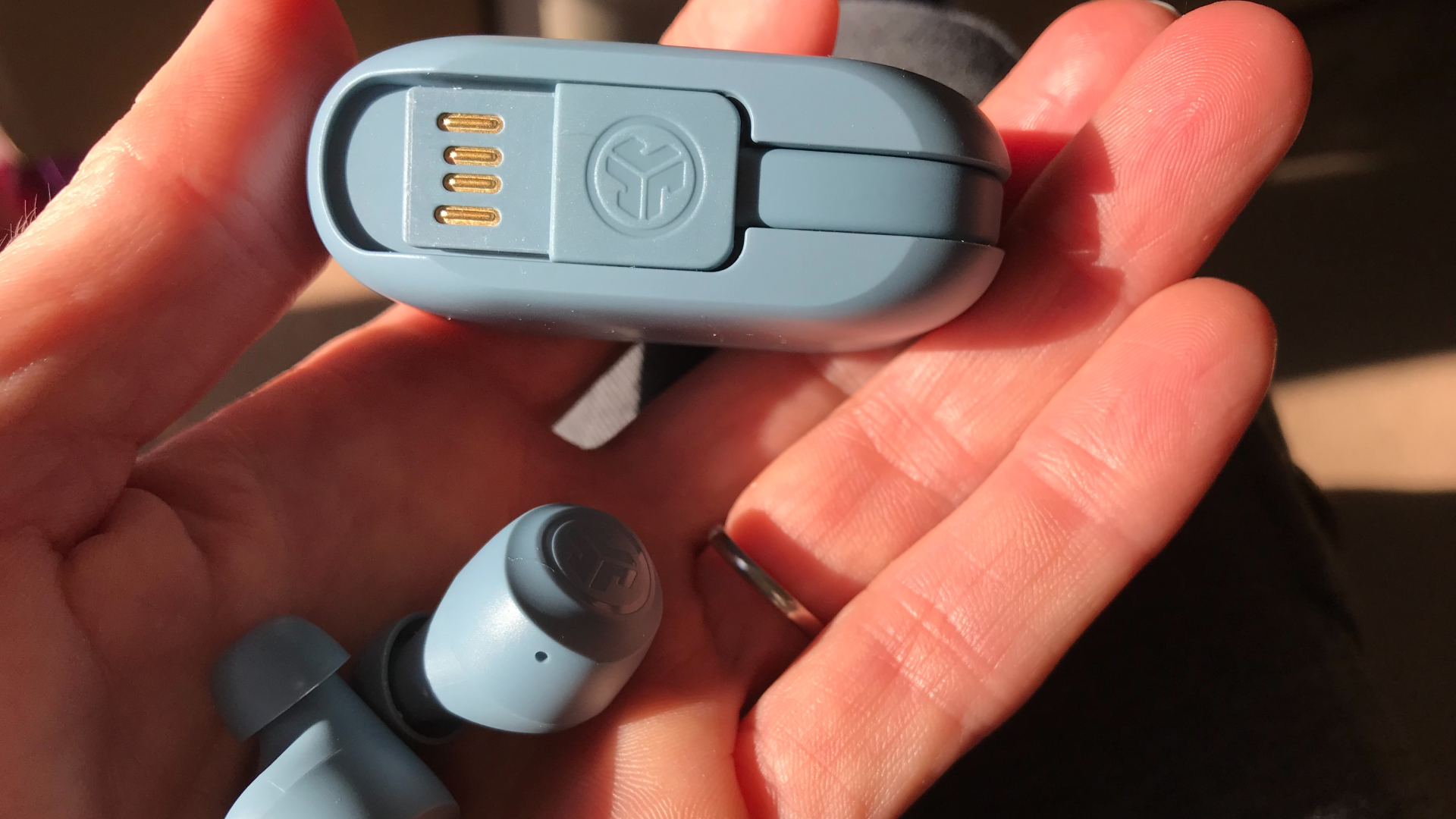 JLab Go Air Pop underneath of the box revealing charging cable