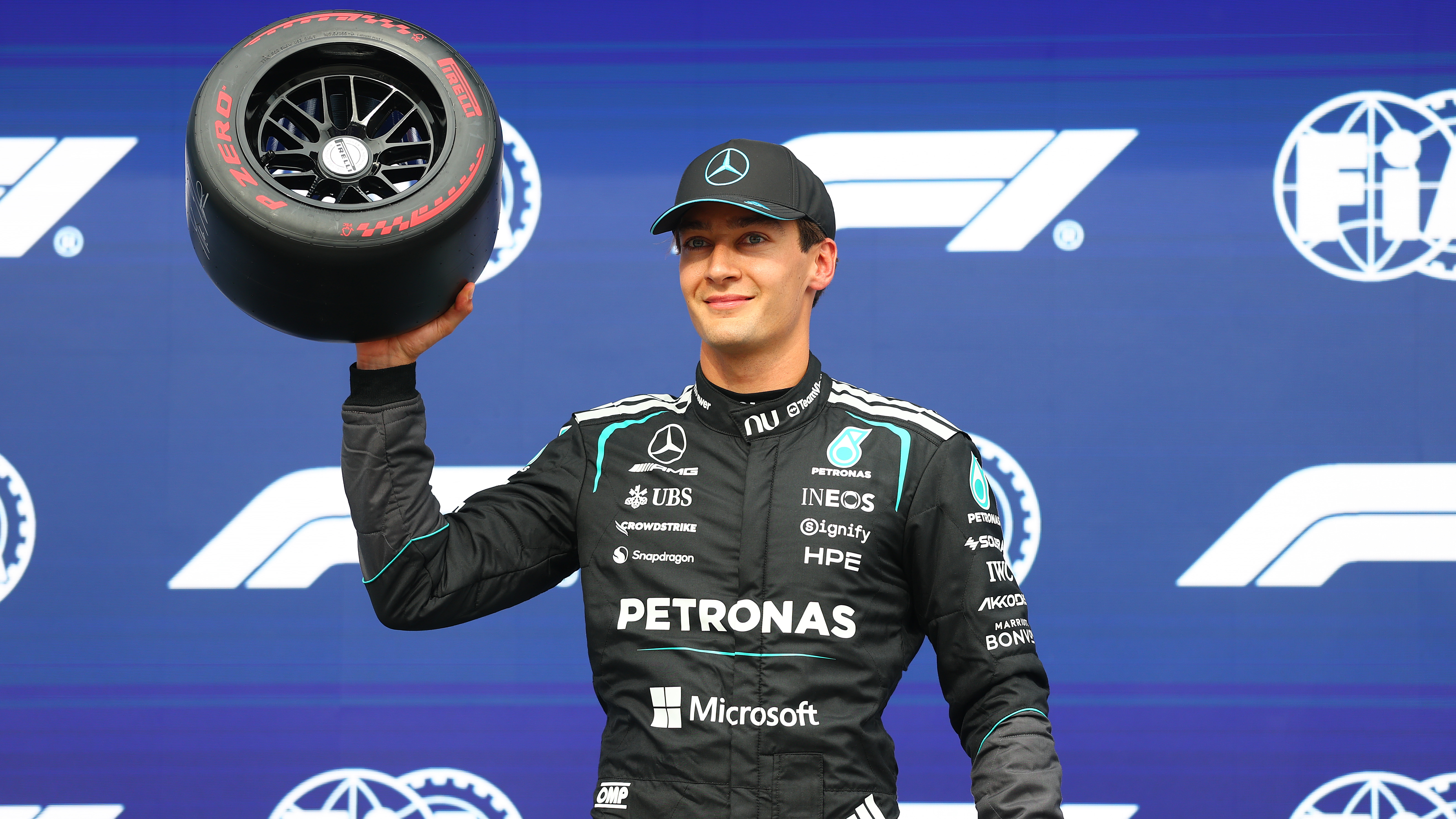 Pole position qualifier George Russell of Great Britain and Mercedes AMG Petronas F1 Team with his Pirelli Pole Position award during qualifying ahead of the F1 Grand Prix of Canada