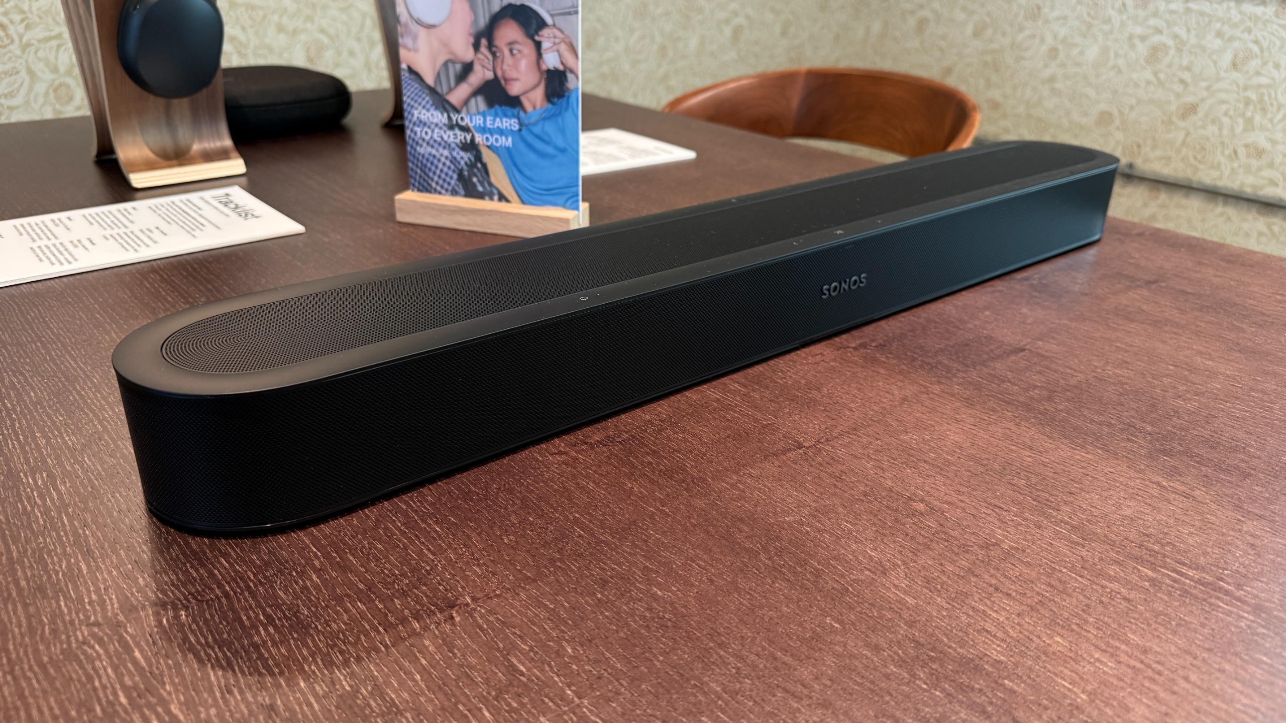 The Sonos Beam Ultra on a wooden table