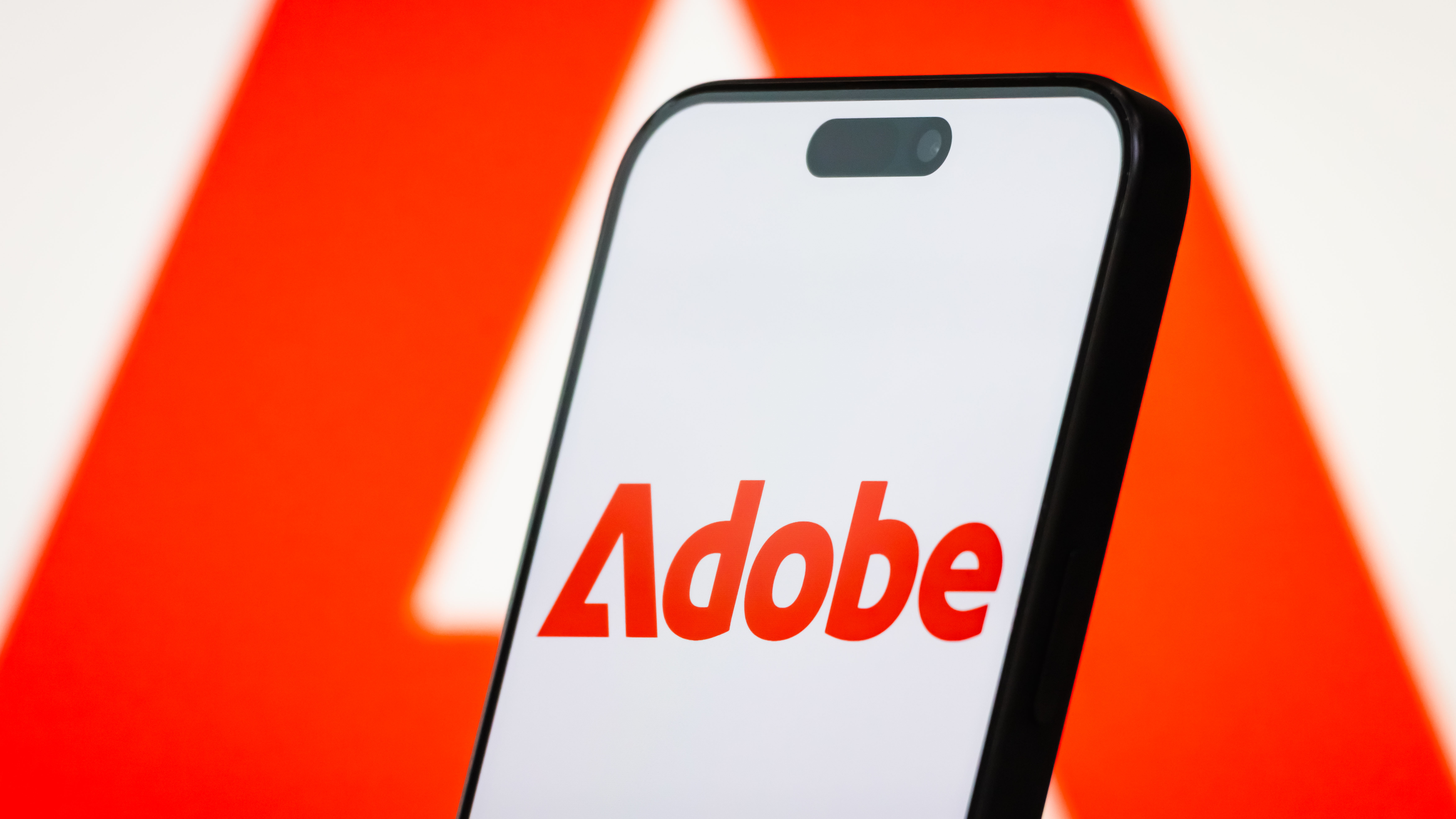 Adobe logo on a smartphone