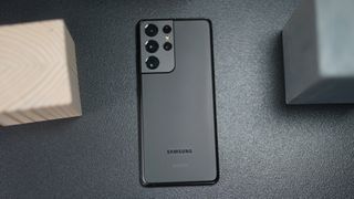 The Samsung Galaxy S21 Ultra laying flat on a surface