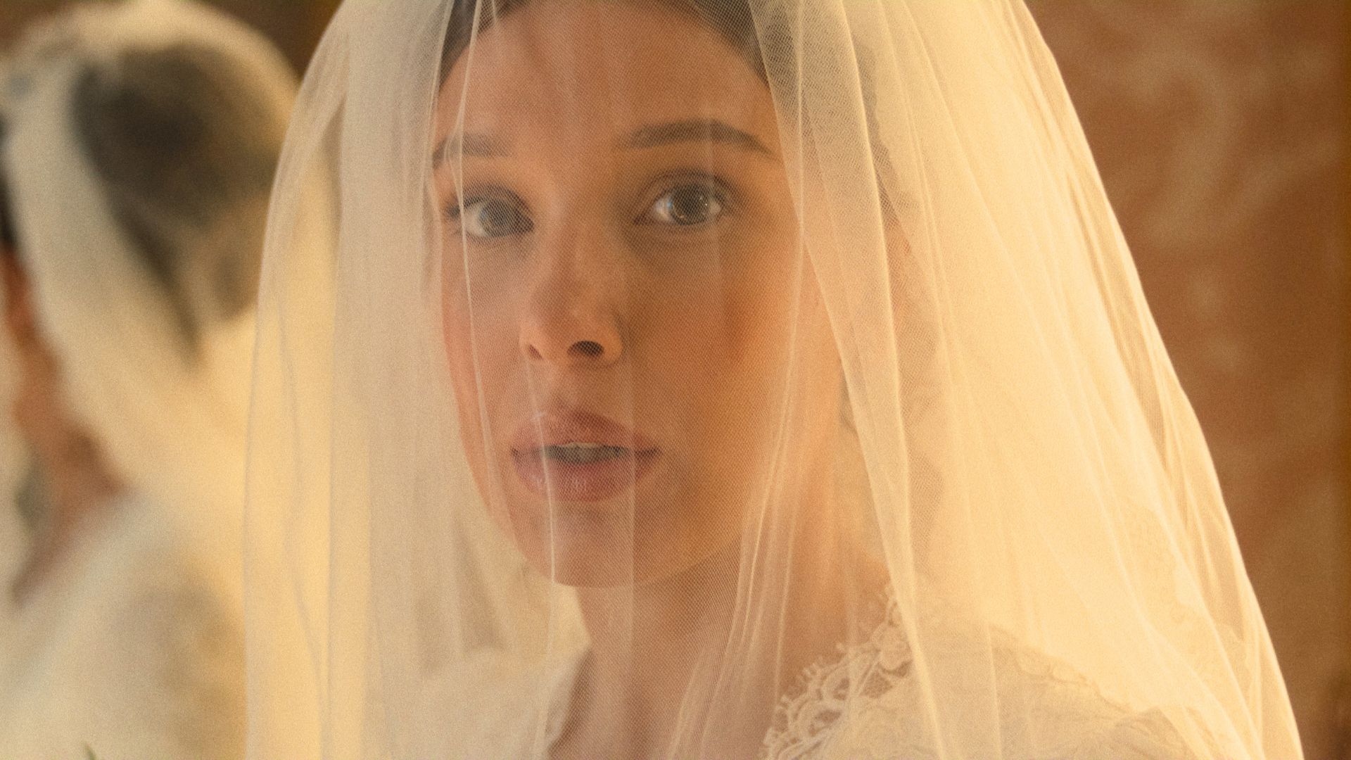 Millie Bobby Brown in a bridal veil